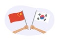 South Korea and China flags. Chinese and Korean national symbols. Hand holding waving flag. Vector Royalty Free Stock Photo